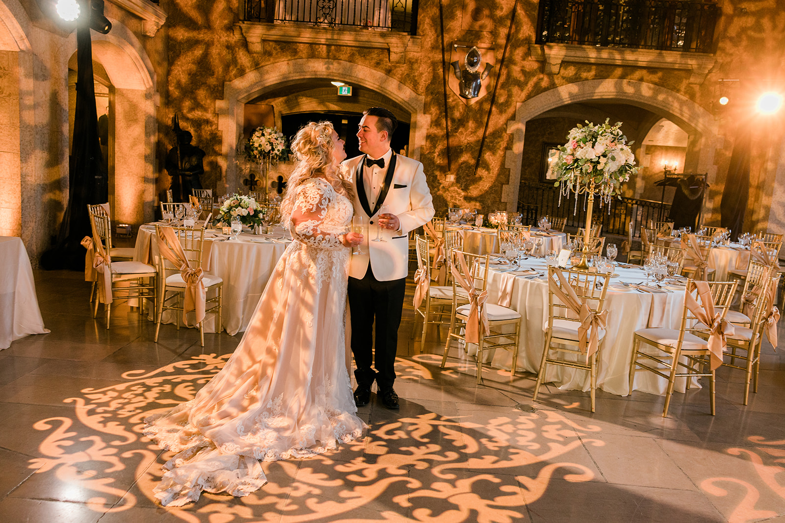 First dance under gold gobo lighting in the Banff Springs ballroom